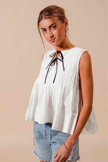 The Chloe Sleeveless Bow-Front Top